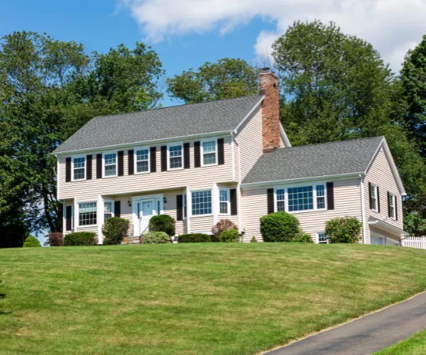 Attached ADU home addition construction expanding living space connected to main house in Dallas Texas