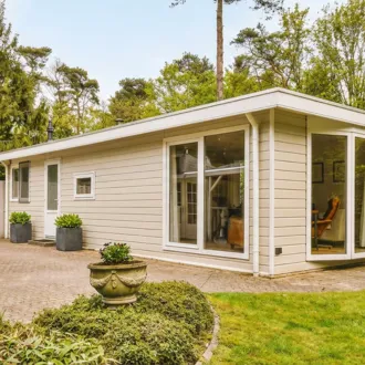 Small detached ADU backyard unit with private entrance designed for in-law suite or rental space in Dallas Texas